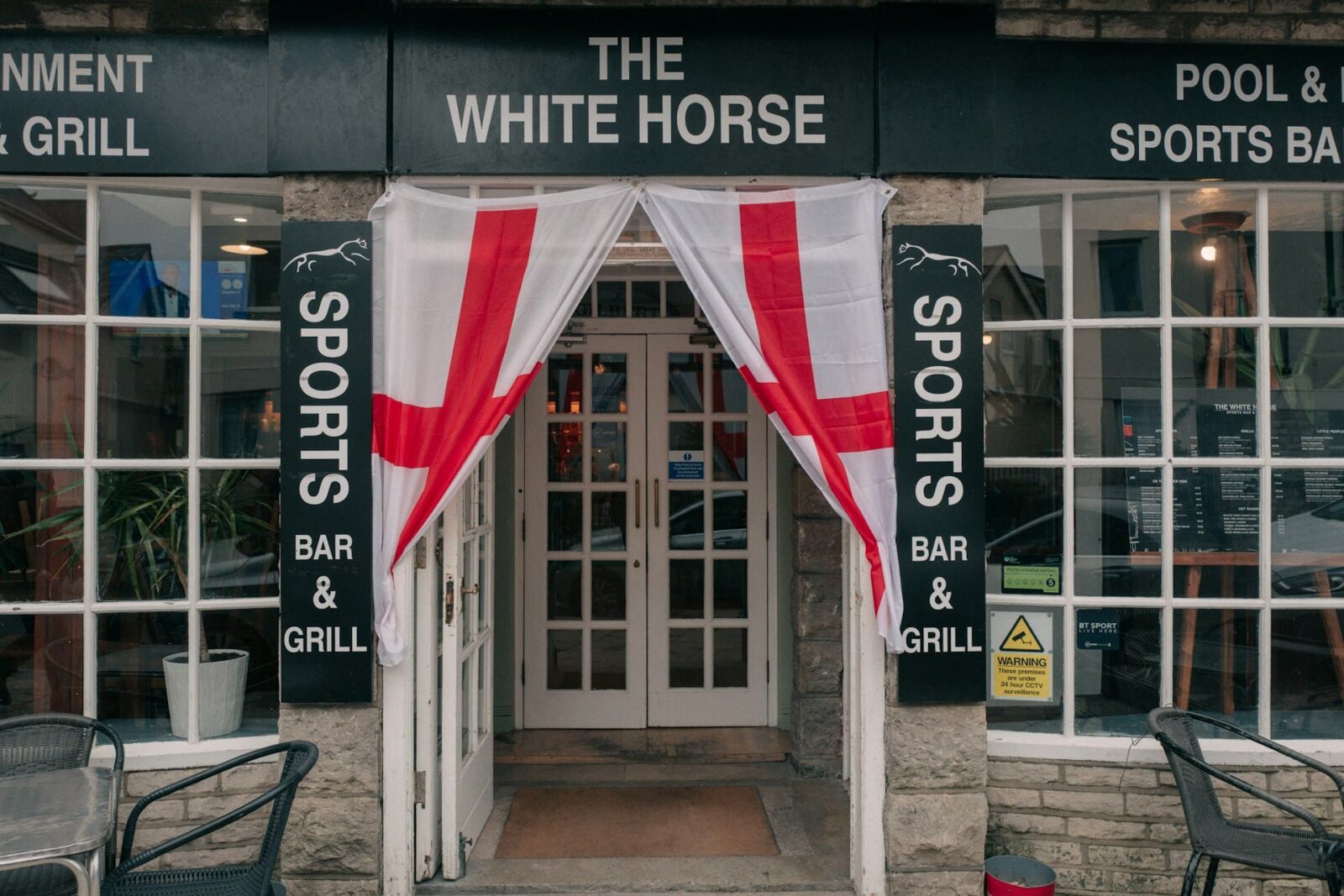 World Cup fans in a UK pub as the price of a pint rises